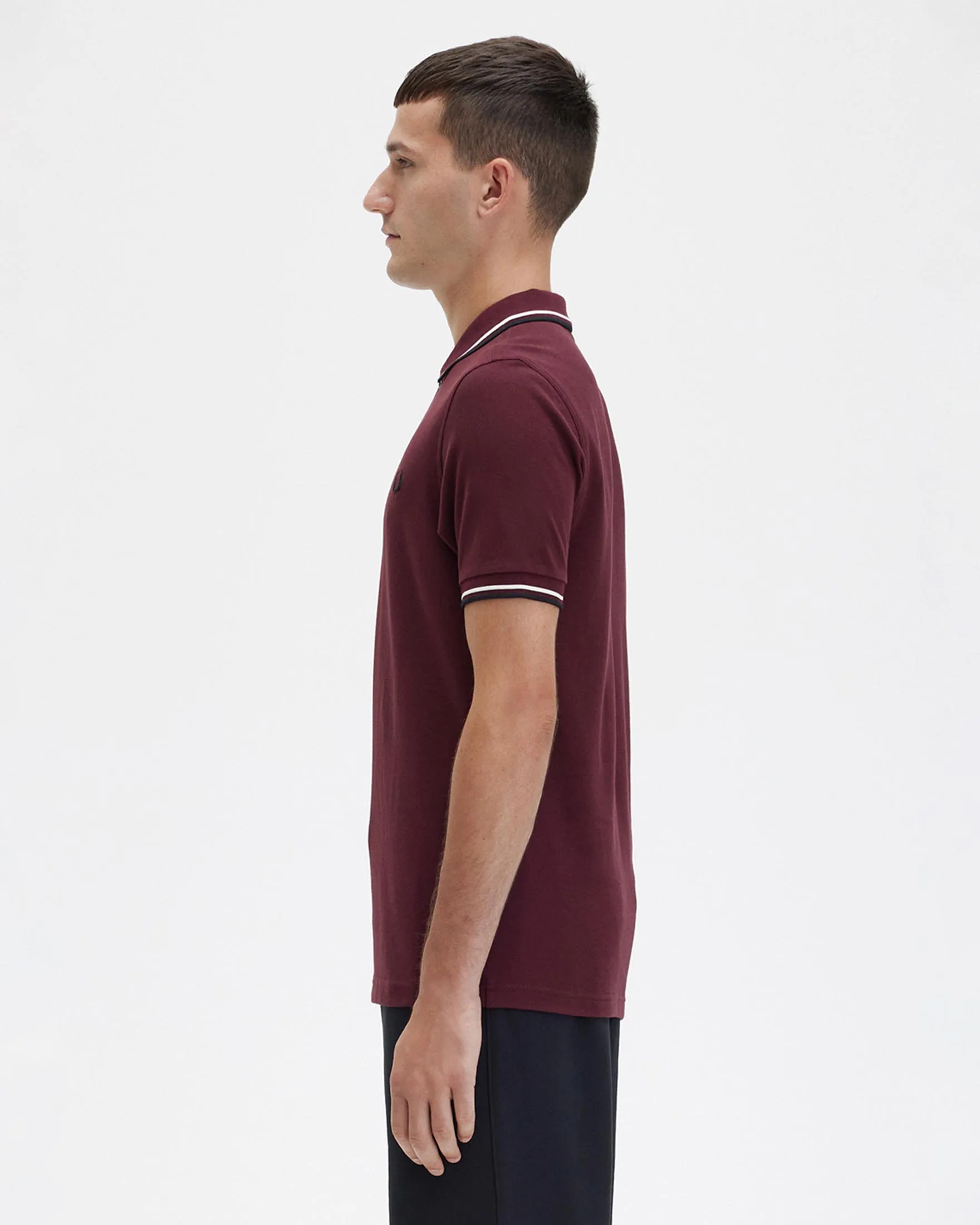 Polo mezza manica bordeaux con bordino nero e bianco